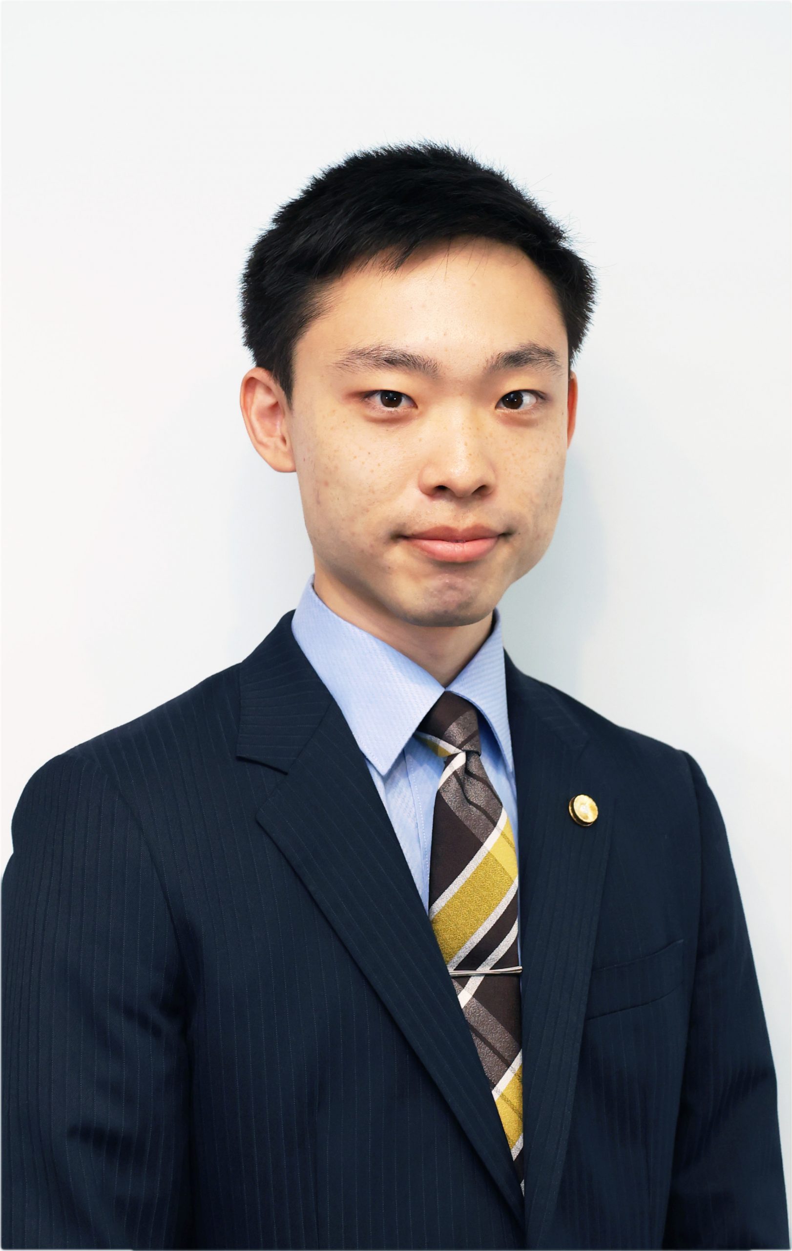 飯田 喜充 YOSHINOBU IIDA 弁護士